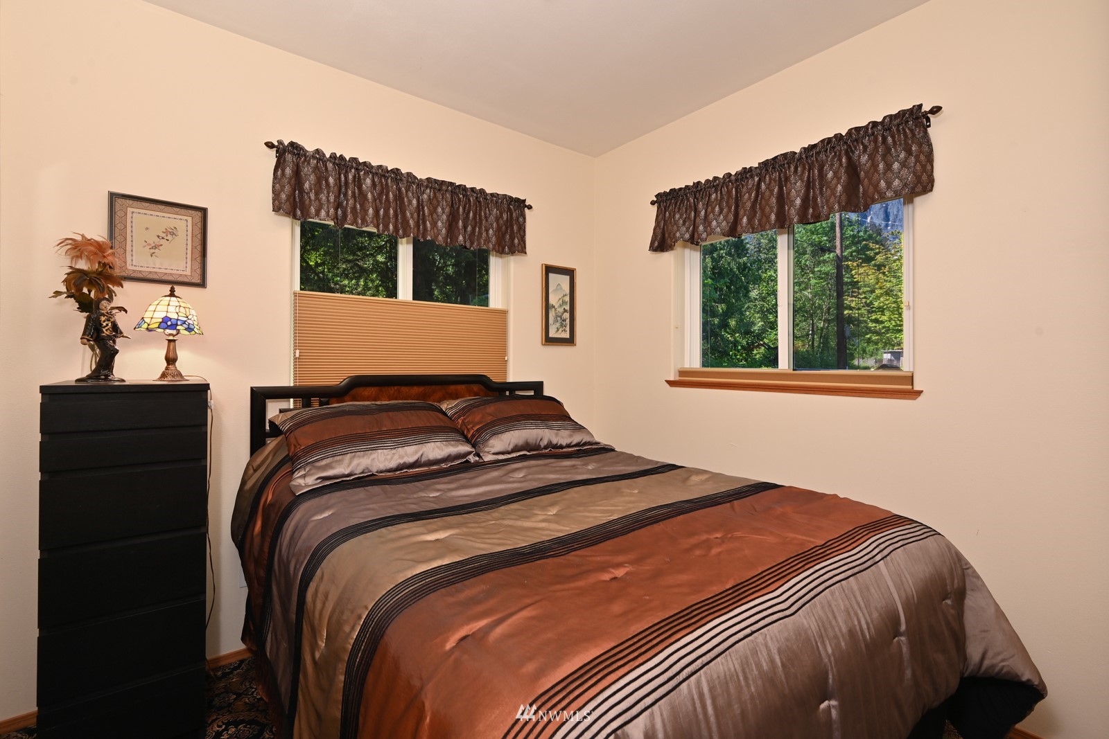 52133 South Riverside Road Gold Bar, WA 98251 - Photo 20 of 40 a bedroom with a bed and a window