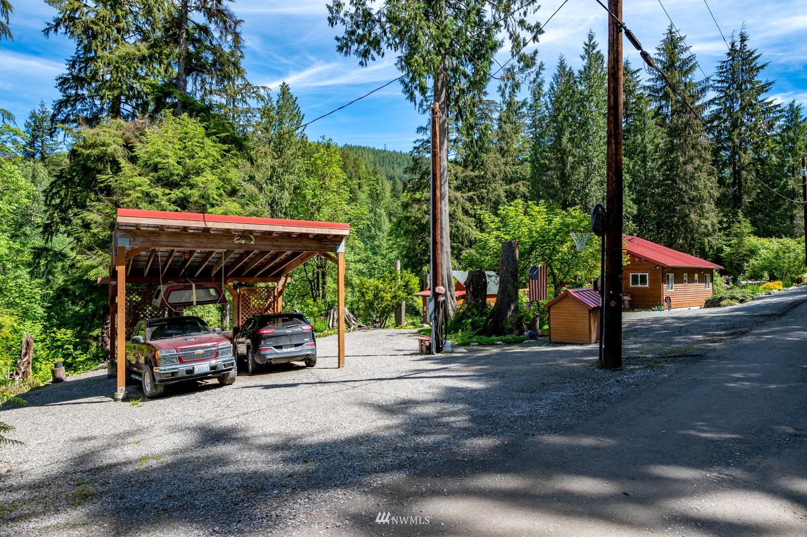 52133 South Riverside Road Gold Bar, WA 98251 - Photo 2 of 40 a view of car parked on the side of the road