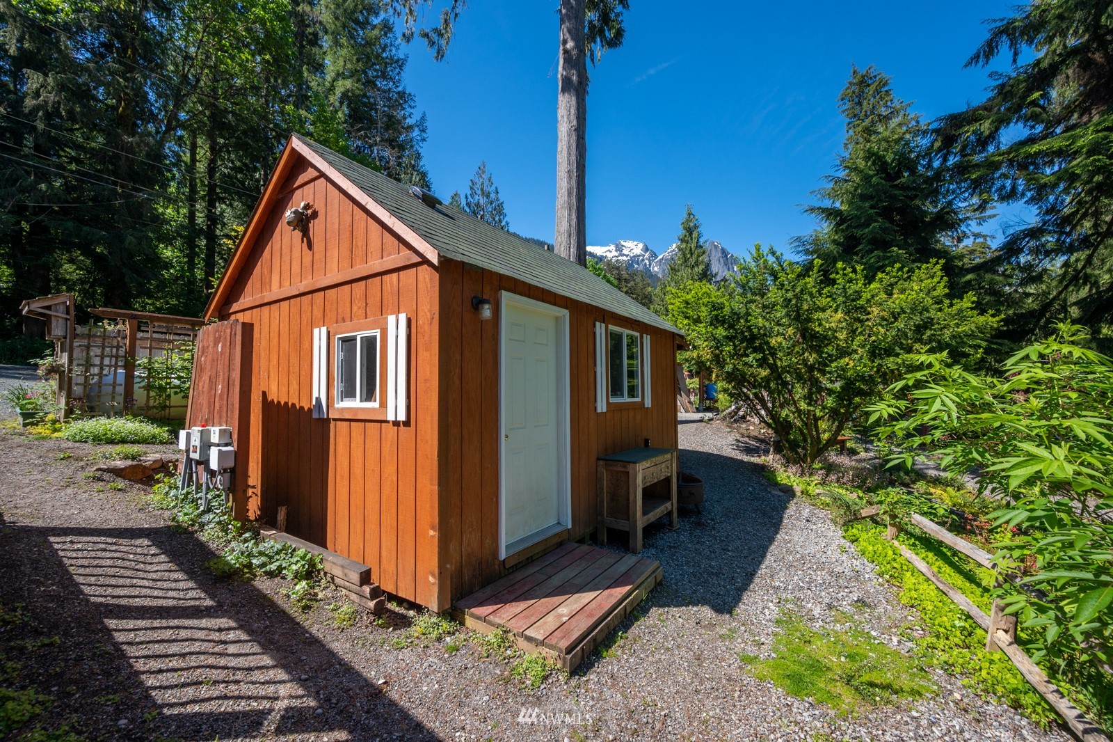 52133 South Riverside Road Gold Bar, WA 98251 - Photo 24 of 40 a backyard of a house with seating space