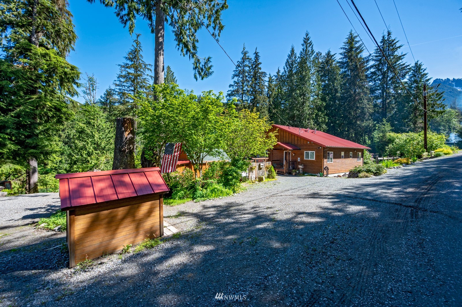 52133 South Riverside Road Gold Bar, WA 98251 - Photo 3 of 40 a view of a house with a yard