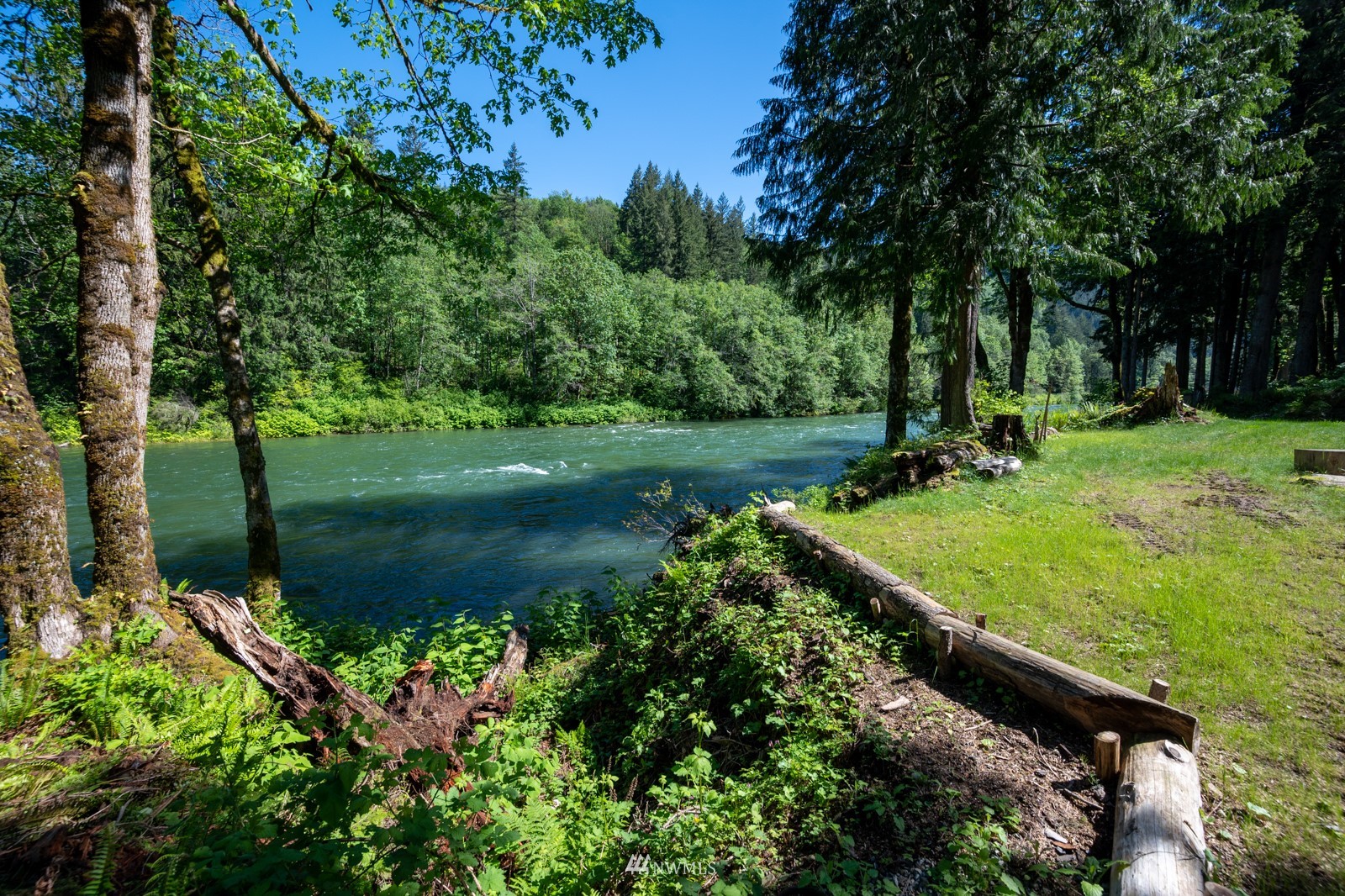 52133 South Riverside Road Gold Bar, WA 98251 - Photo 33 of 40 a view of a lake with a yard