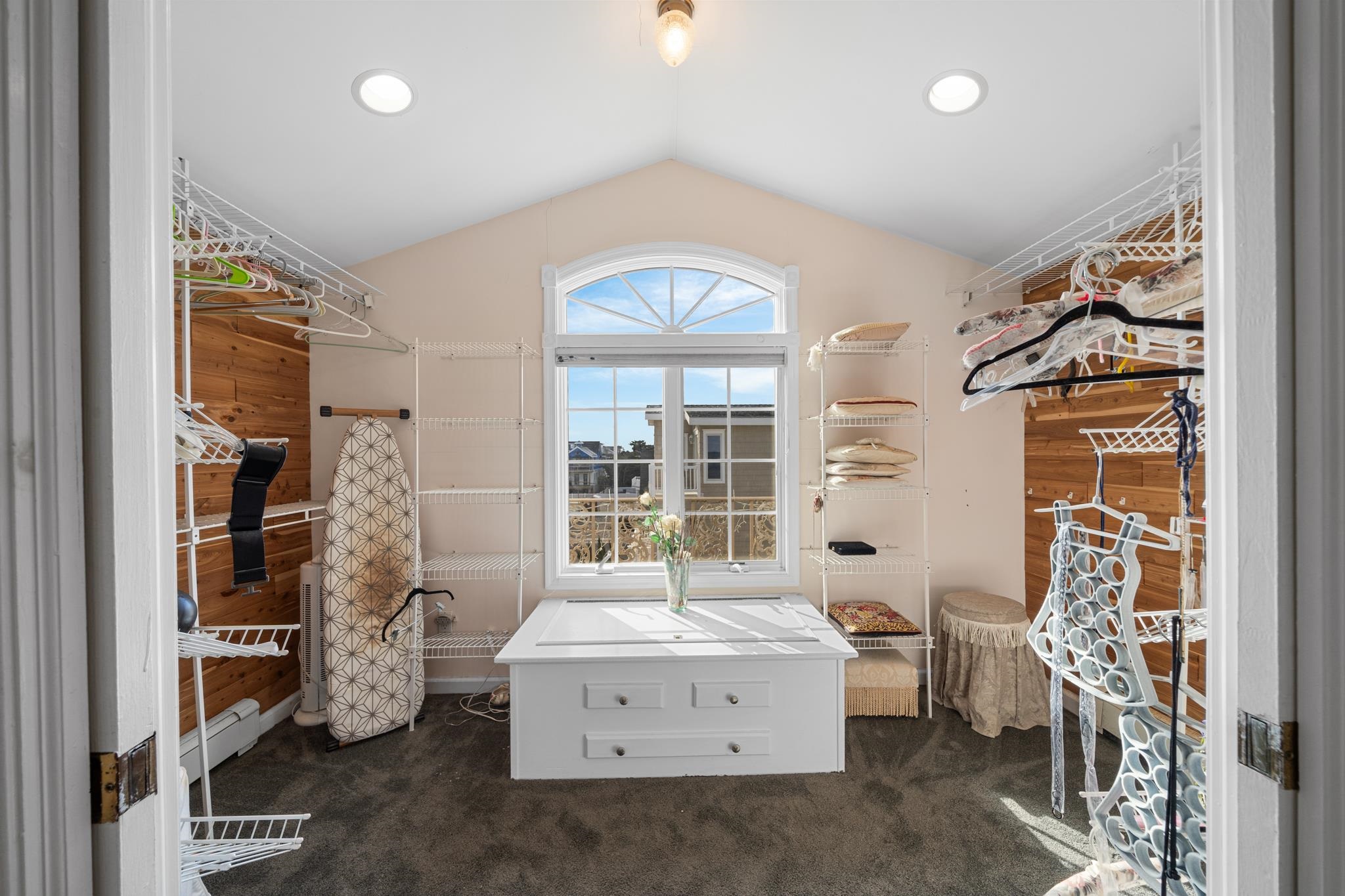 283 6th Street Avalon, NJ 08202 - Photo 31 of 36 a spacious bedroom with a bed and a large window