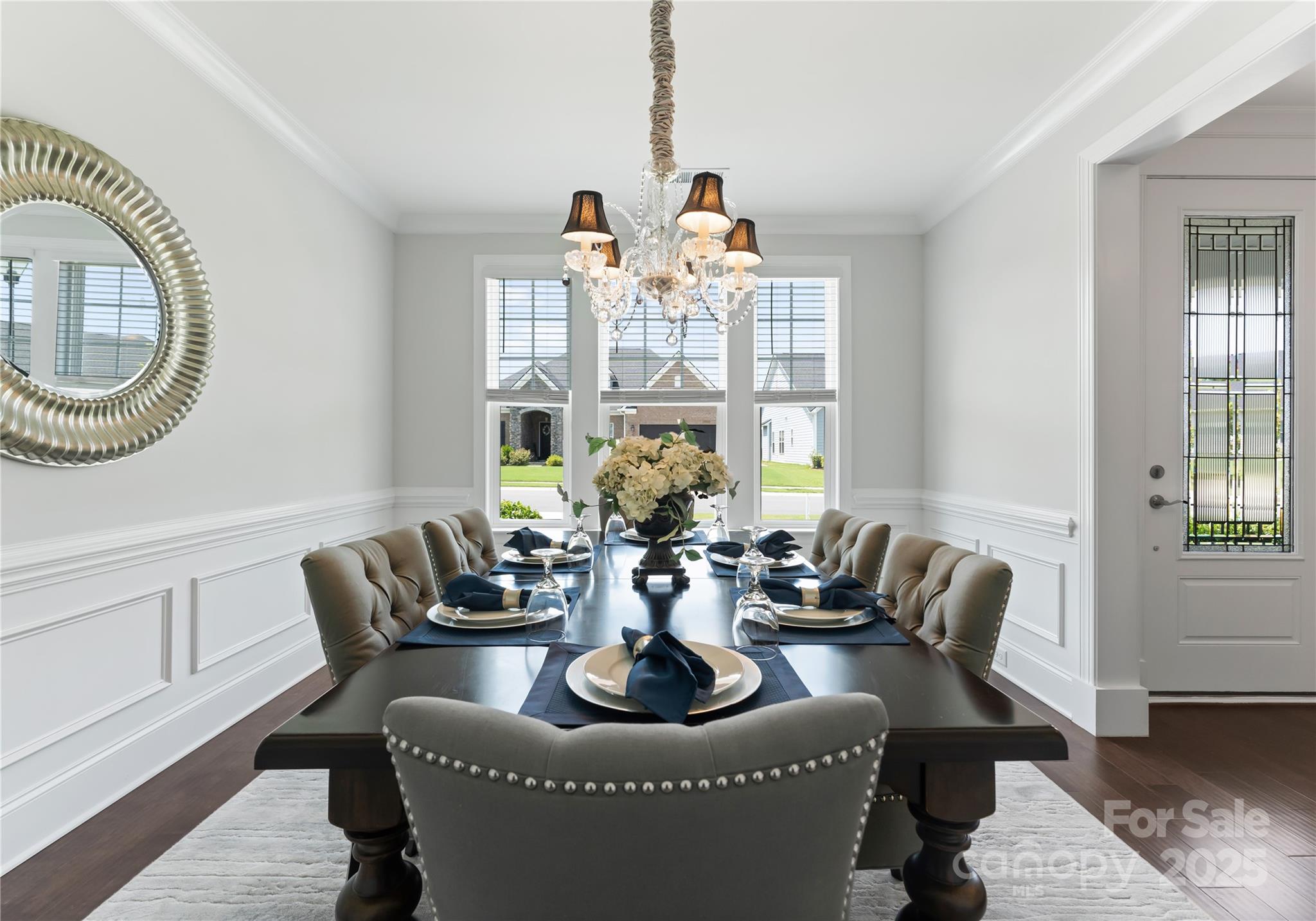 3239 Split Rail Lane Lancaster, SC 29720 - Photo 14 of 39 a dining room with furniture a chandelier and wooden floor