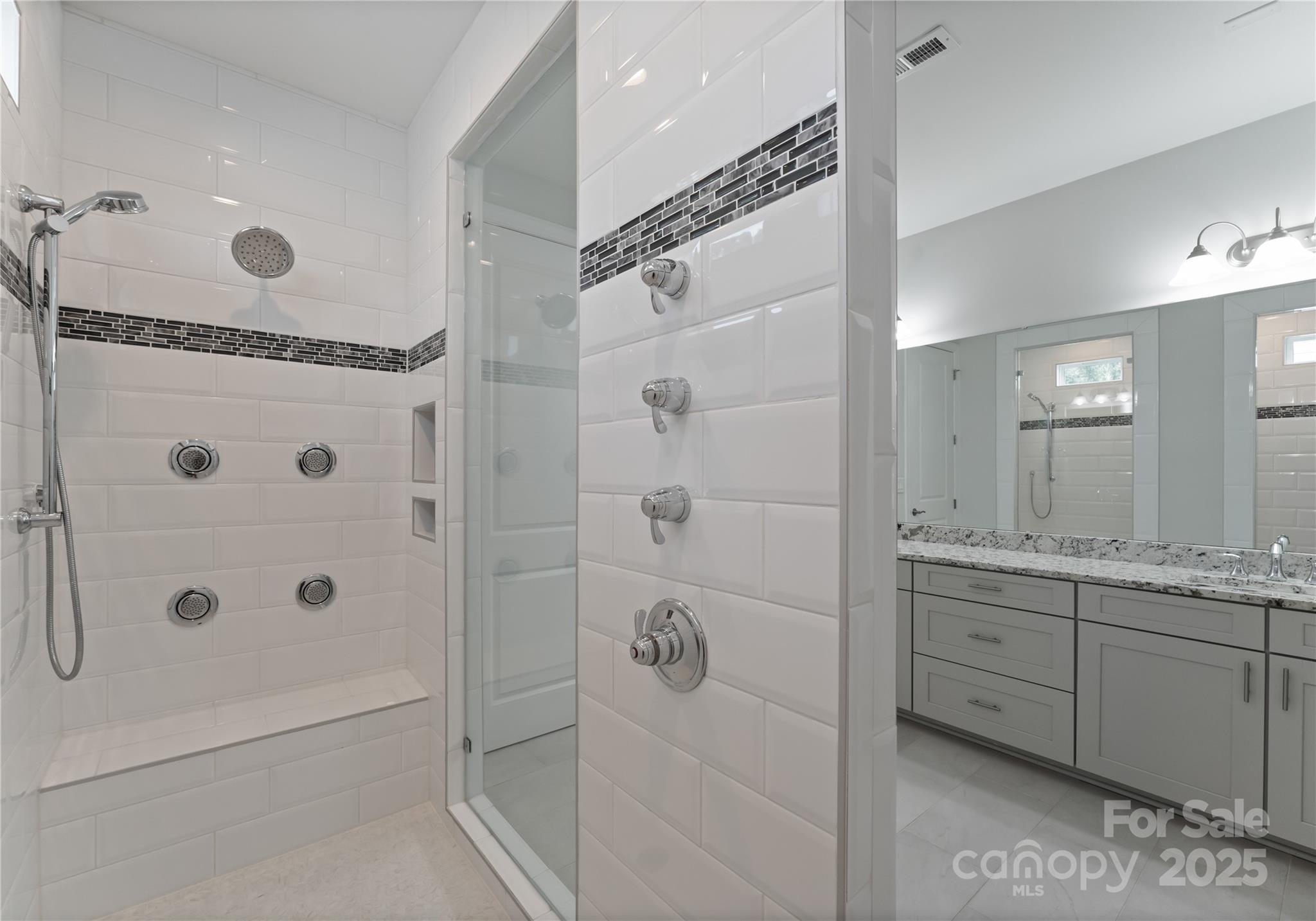 3239 Split Rail Lane Lancaster, SC 29720 - Photo 17 of 39 a bathroom with a shower sink and mirror