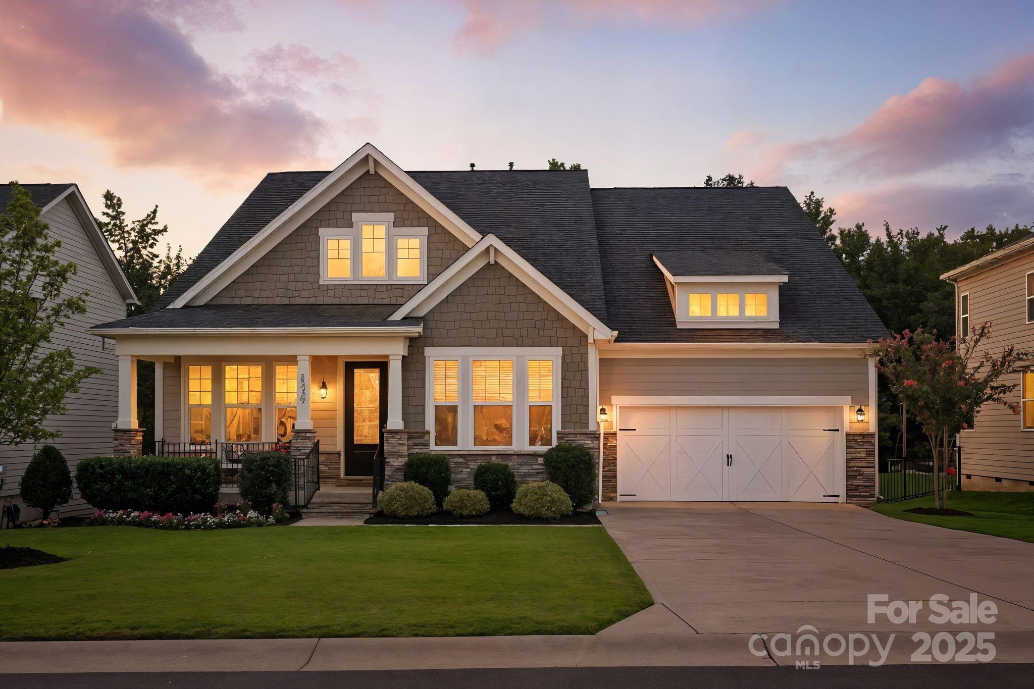 3239 Split Rail Lane Lancaster, SC 29720 - Photo 2 of 39 a front view of a house with a yard and garage