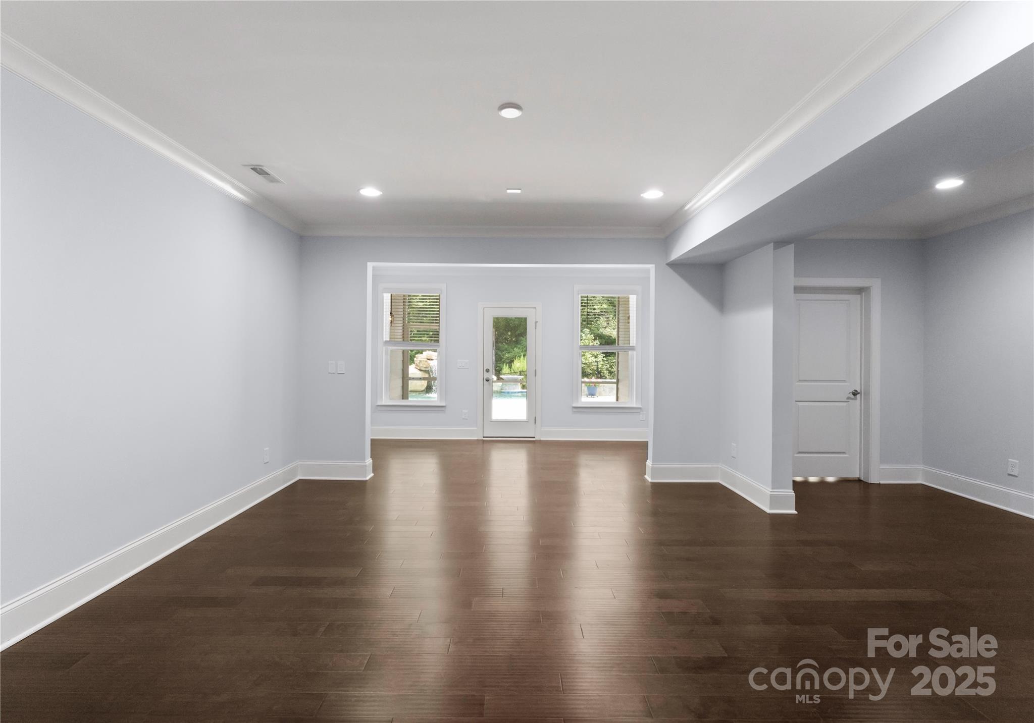 3239 Split Rail Lane Lancaster, SC 29720 - Photo 27 of 39 a view of an empty room with wooden floor and a window