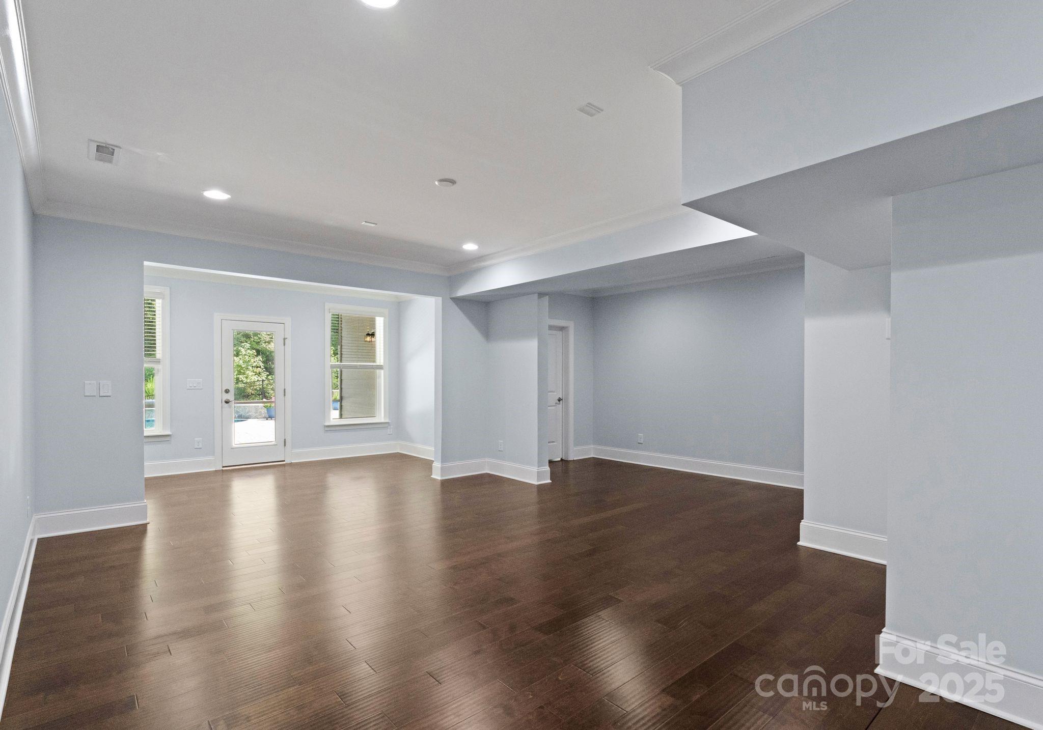 3239 Split Rail Lane Lancaster, SC 29720 - Photo 29 of 39 a view of an empty room with wooden floor and a window