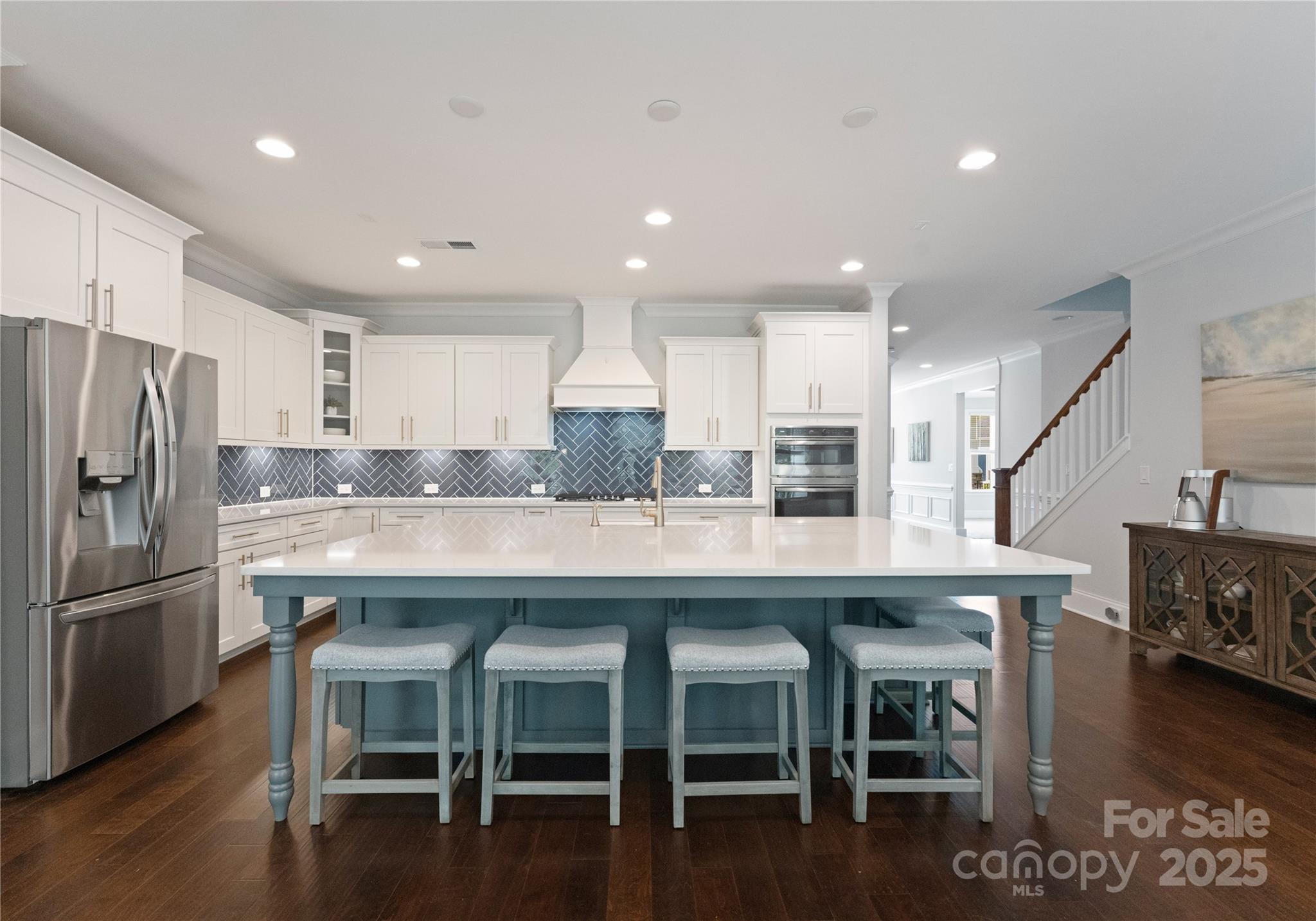 3239 Split Rail Lane Lancaster, SC 29720 - Photo 8 of 39 a kitchen with stainless steel appliances granite countertop a table chairs sink refrigerator and microwave
