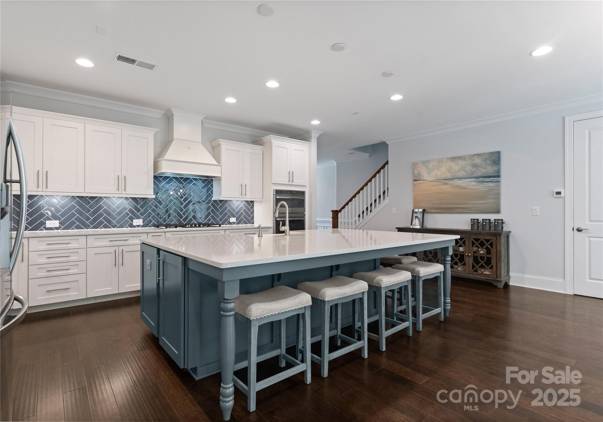 3239 Split Rail Lane Lancaster, SC 29720 - Photo 9 of 39 a kitchen with stainless steel appliances granite countertop a table chairs sink and cabinets