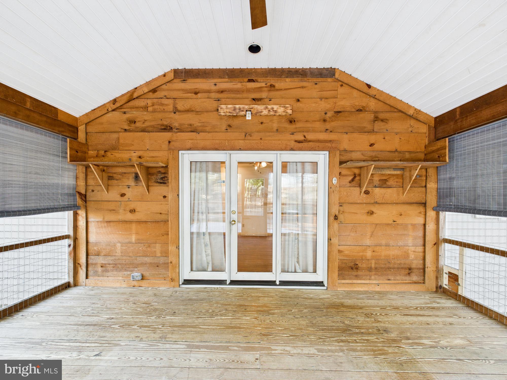 5046 Manokin Road Crisfield, MD 21817 - Photo 36 of 72 Enclosed porch, 3 seasons of extra living