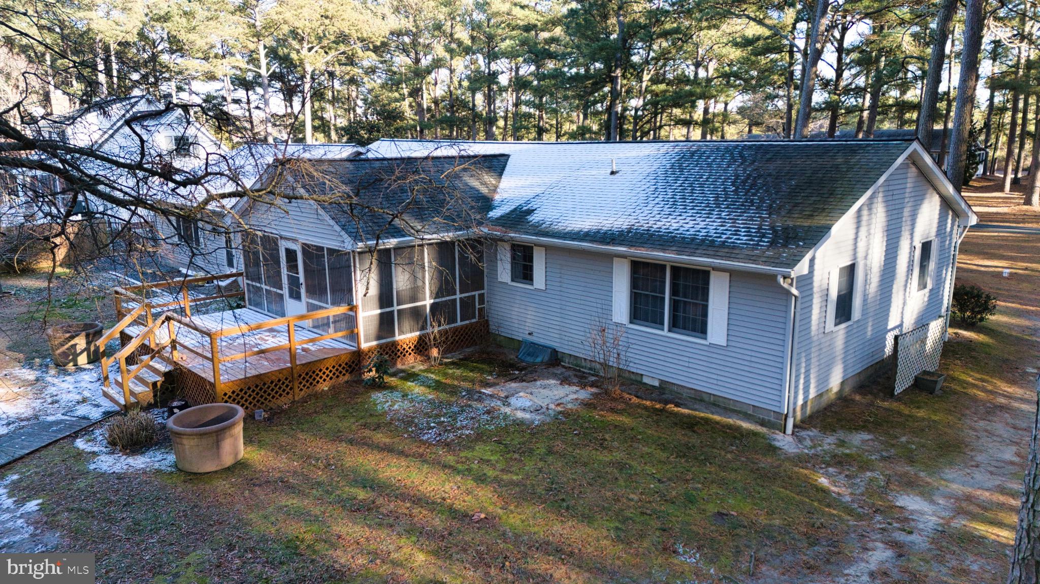 5046 Manokin Road Crisfield, MD 21817 - Photo 60 of 72 Aerial view of back porch and deck