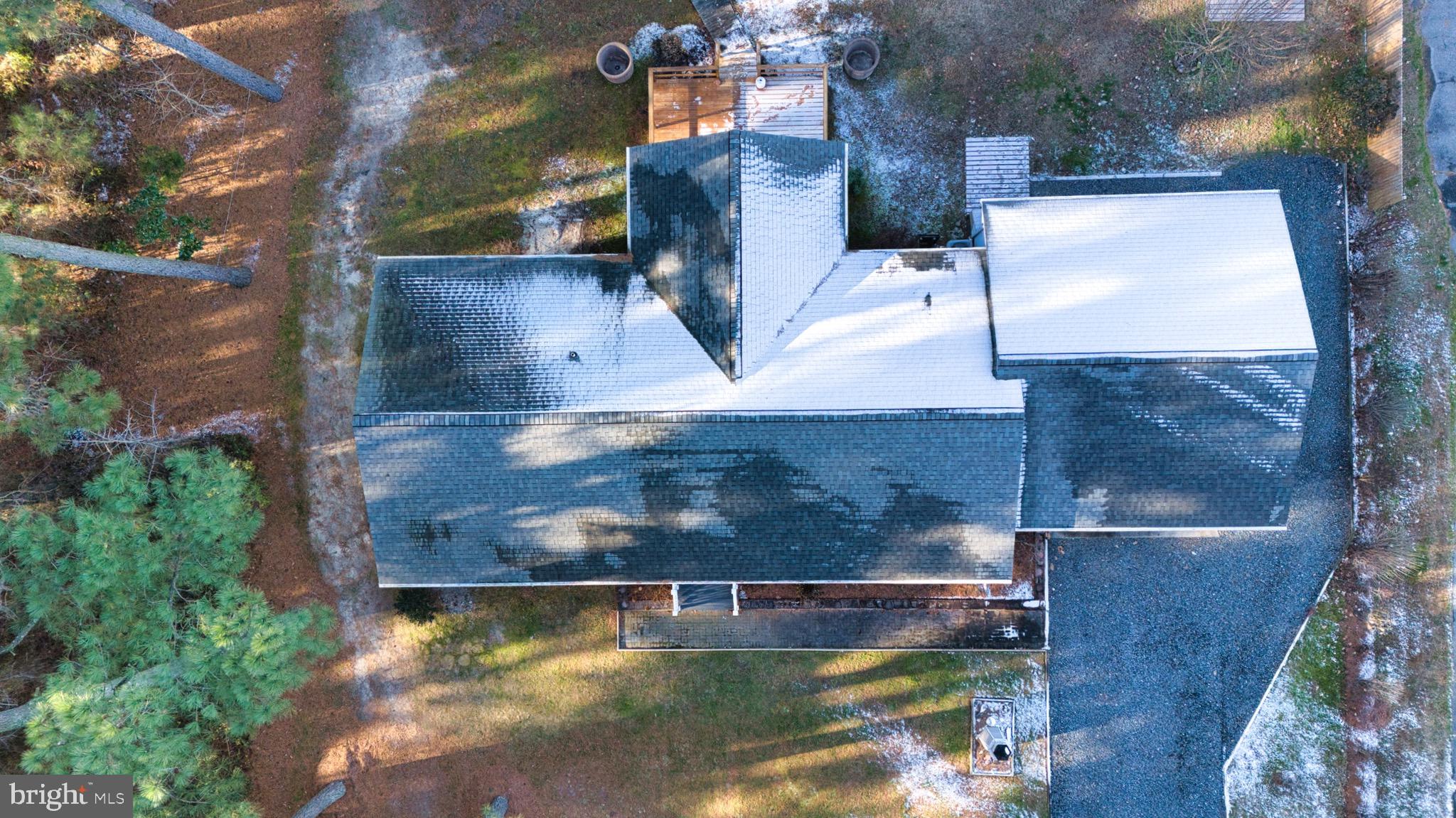 5046 Manokin Road Crisfield, MD 21817 - Photo 71 of 72 an aerial view of a house with a yard