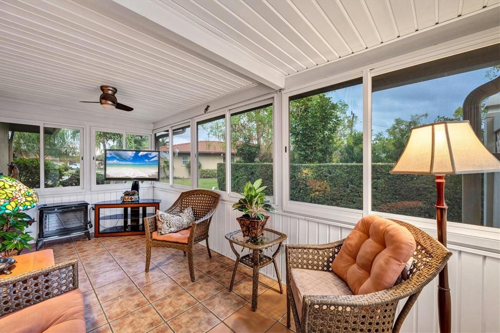 6416 Mercer Road Bradenton, FL 34207 - Photo 21 of 38 a living room filled with furniture and a large window