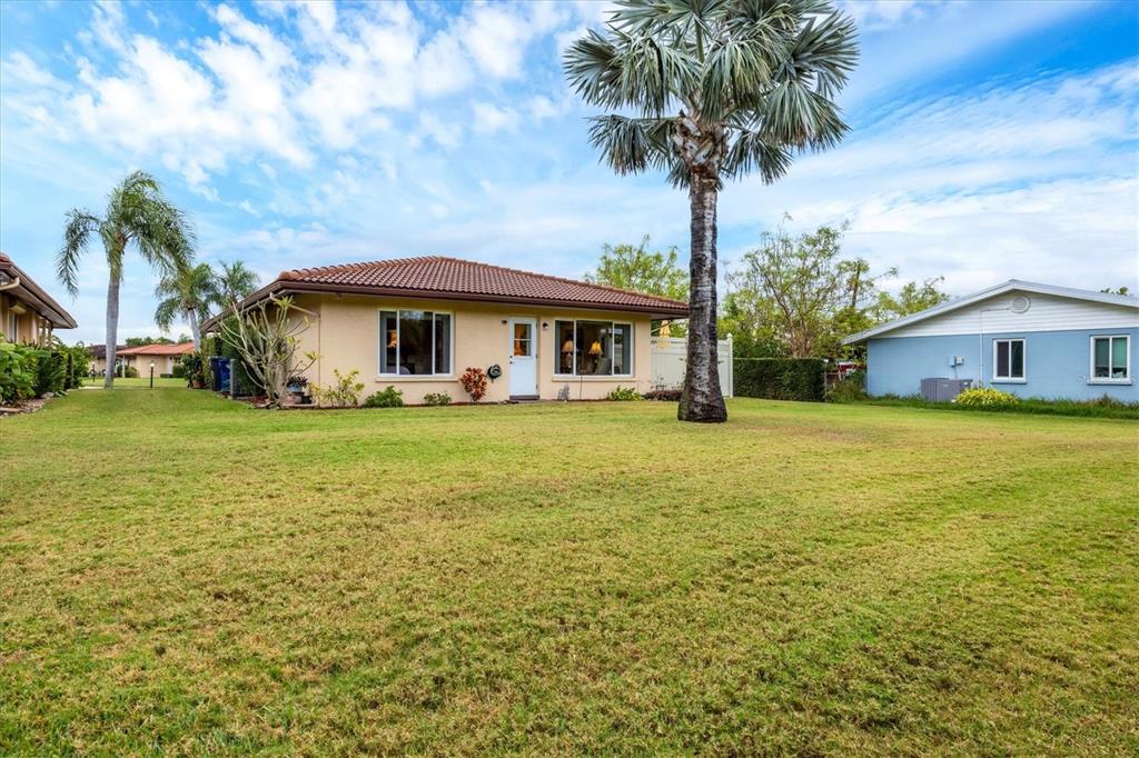 6416 Mercer Road Bradenton, FL 34207 - Photo 28 of 38 a front view of a house with garden