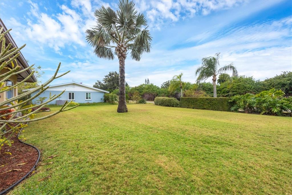 6416 Mercer Road Bradenton, FL 34207 - Photo 29 of 38 a front view of a house with a yard
