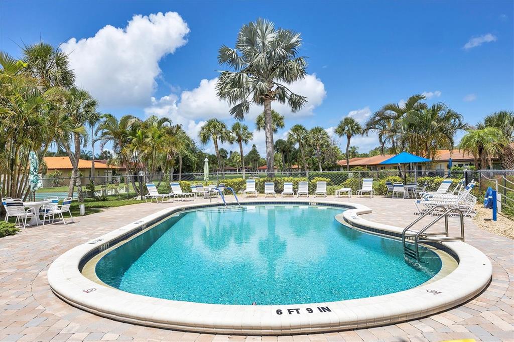 6416 Mercer Road Bradenton, FL 34207 - Photo 30 of 38 a view of a swimming pool with outdoor seating