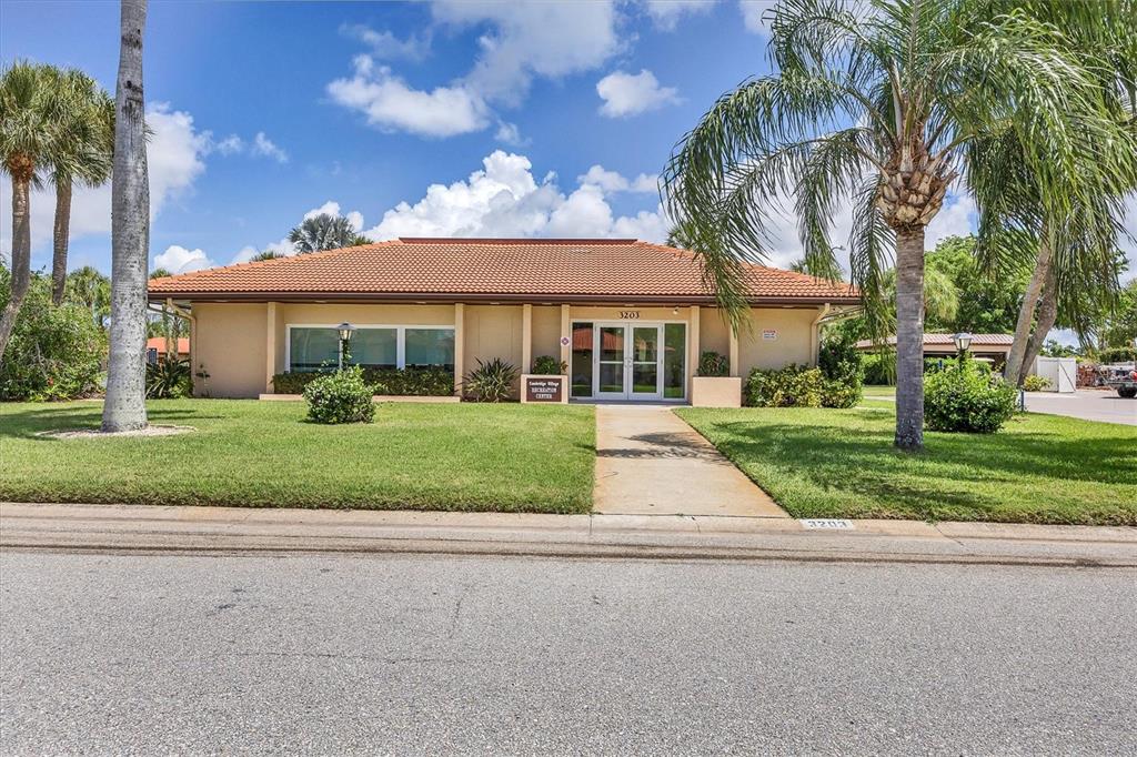 6416 Mercer Road Bradenton, FL 34207 - Photo 34 of 38 front view of house with a yard