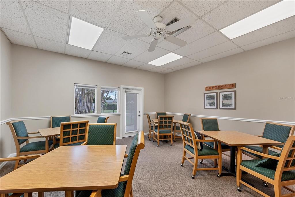 6416 Mercer Road Bradenton, FL 34207 - Photo 37 of 38 a view of a dining room with furniture window and wooden floor