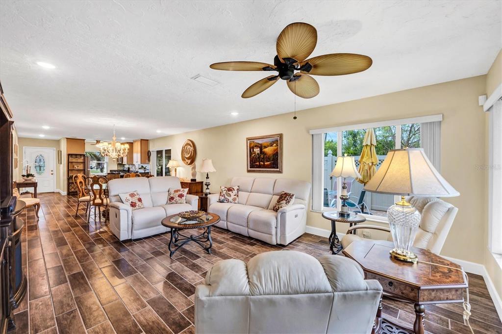 6416 Mercer Road Bradenton, FL 34207 - Photo 4 of 38 a living room with furniture and a large window