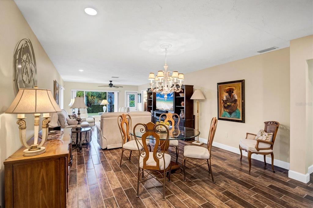 6416 Mercer Road Bradenton, FL 34207 - Photo 9 of 38 a view of a dining room with furniture window and outside view