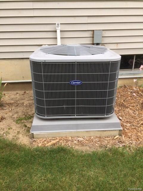 2460 North Henderson Road Davison, MI 48423 - Photo 38 of 42 Henderson Air Conditioner.JPG