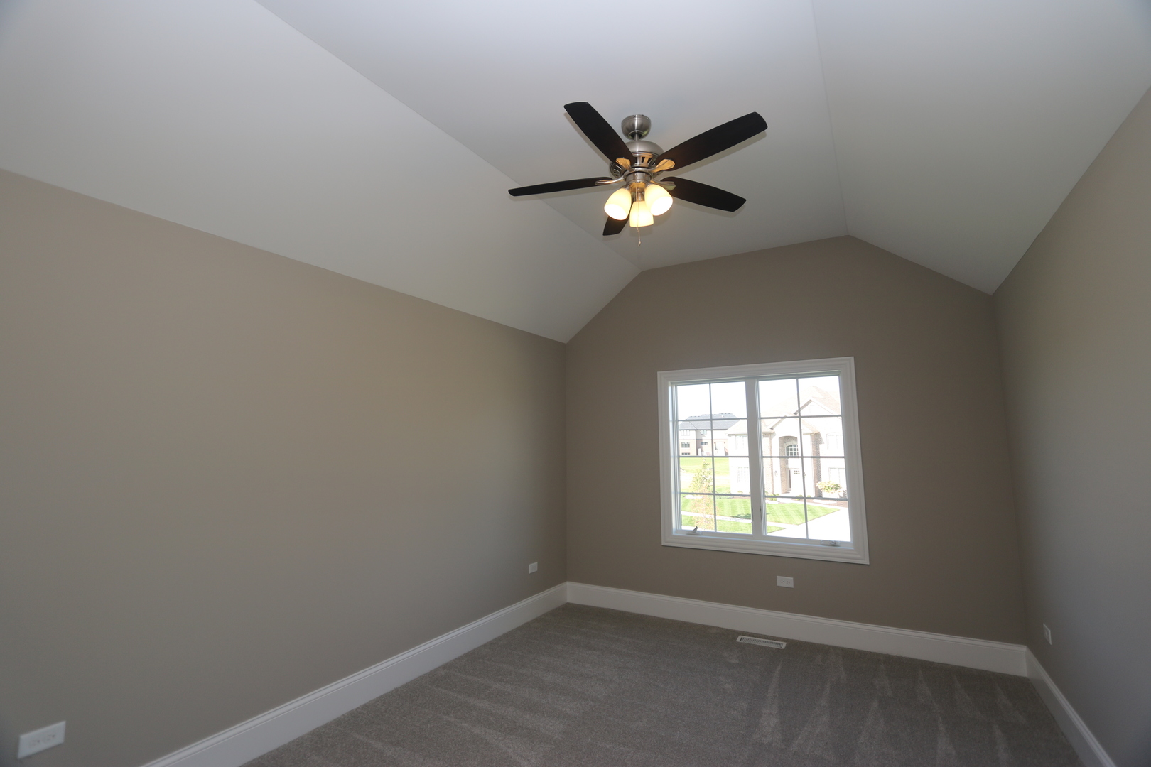 8613 High Stone Way Frankfort, IL 60423 - Photo 25 of 31 an empty room with a window and a fan