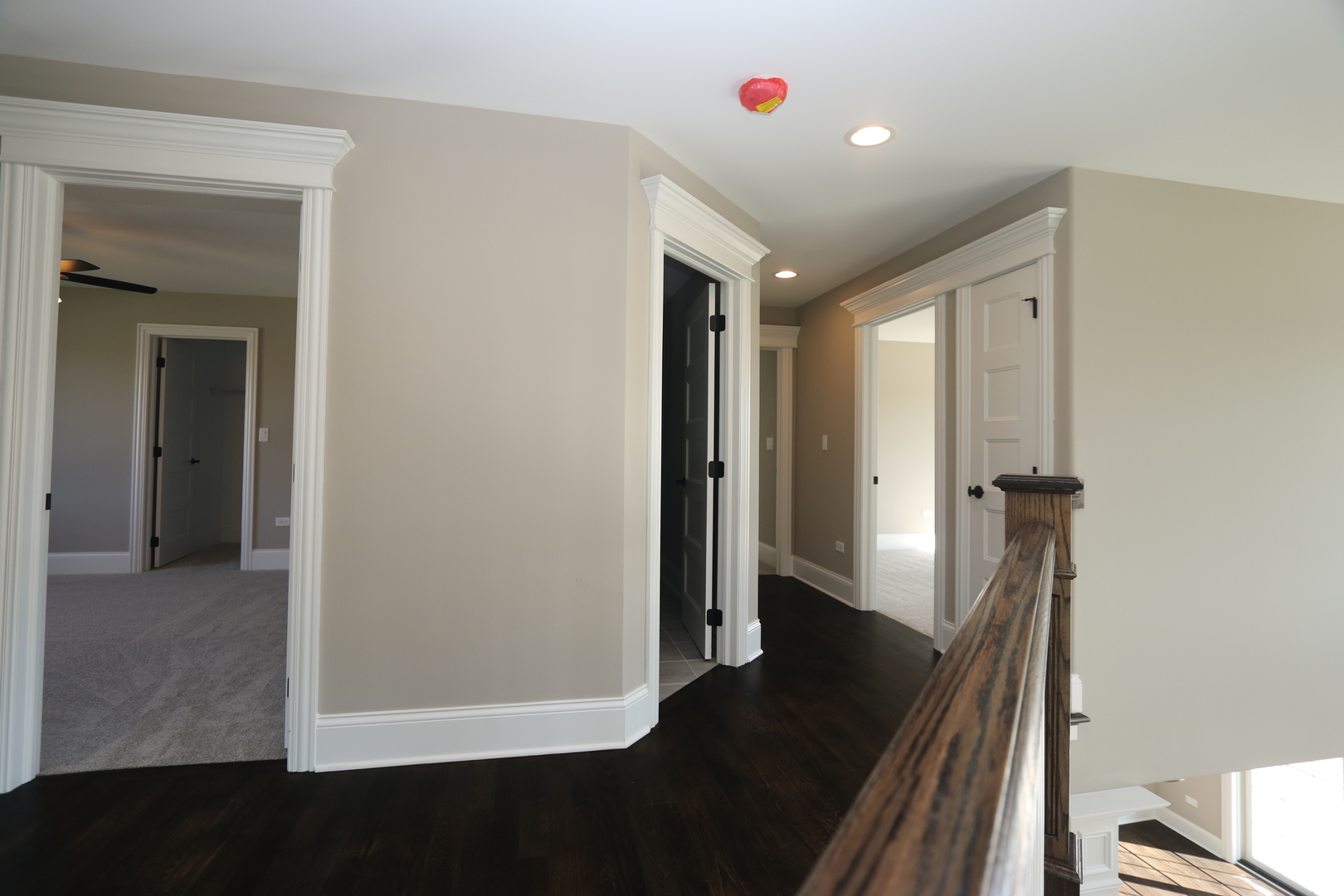 8613 High Stone Way Frankfort, IL 60423 - Photo 26 of 31 a view of hallway with stairs and wooden floor