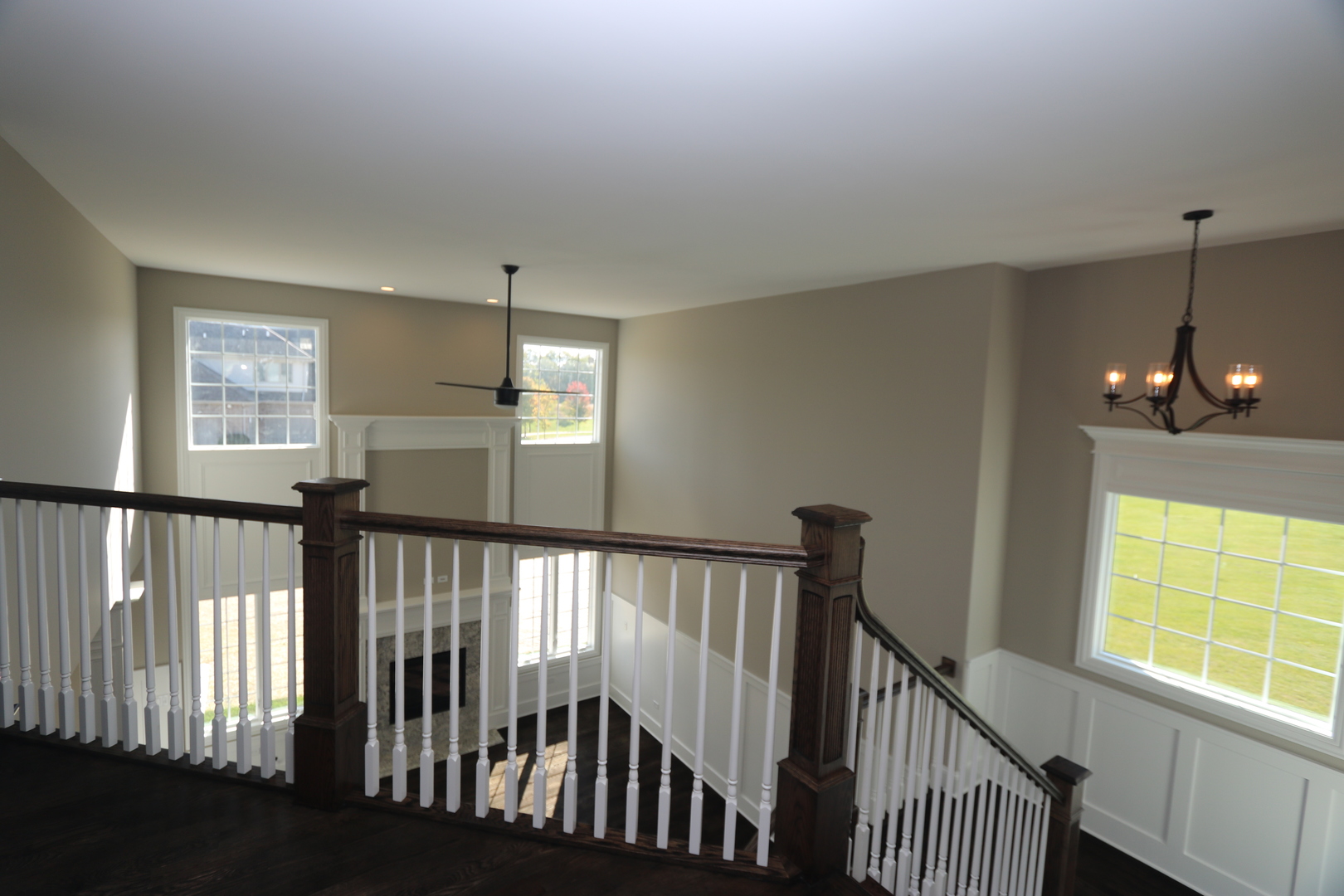 8613 High Stone Way Frankfort, IL 60423 - Photo 28 of 31 a view of a hallway with windows and stairs