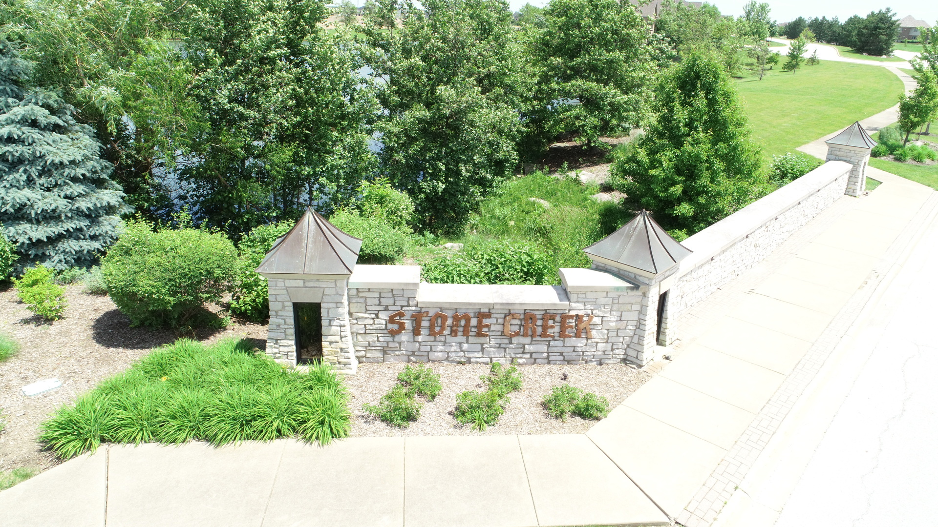 8613 High Stone Way Frankfort, IL 60423 - Photo 30 of 31 a front view of a house with garden