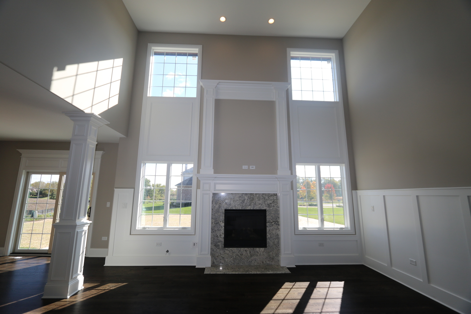 8613 High Stone Way Frankfort, IL 60423 - Photo 6 of 31 a view of an empty room with a fireplace and a window