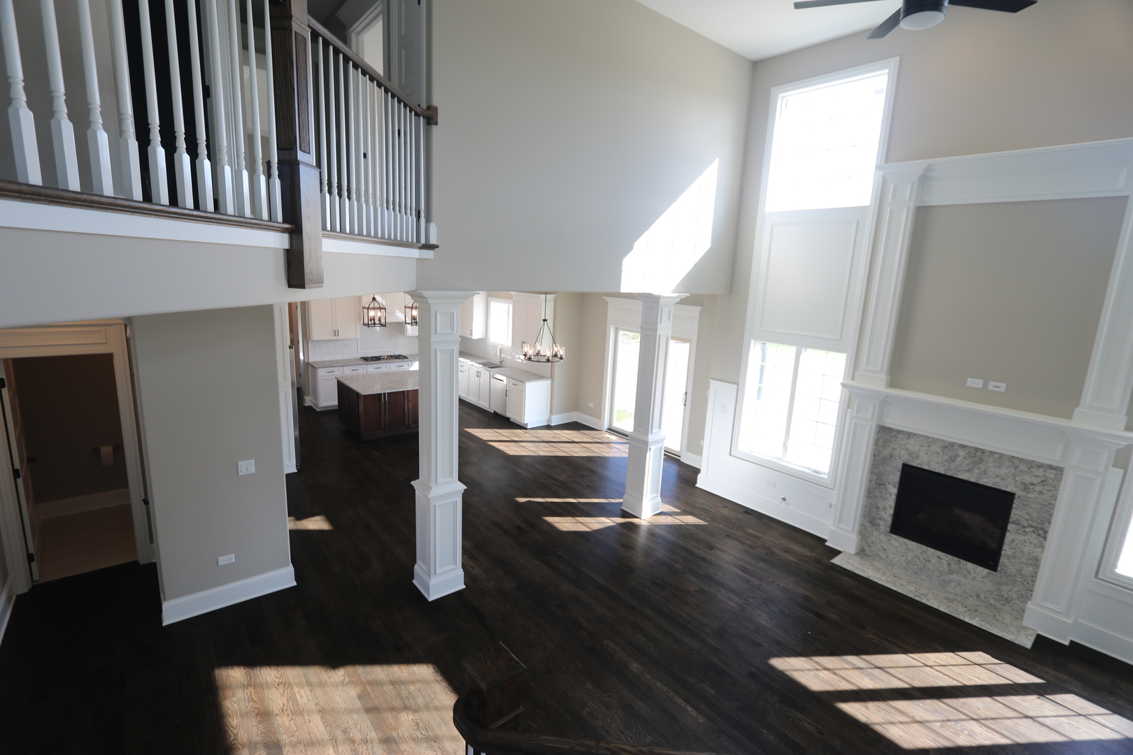 8613 High Stone Way Frankfort, IL 60423 - Photo 8 of 31 a kitchen with furniture and a fireplace