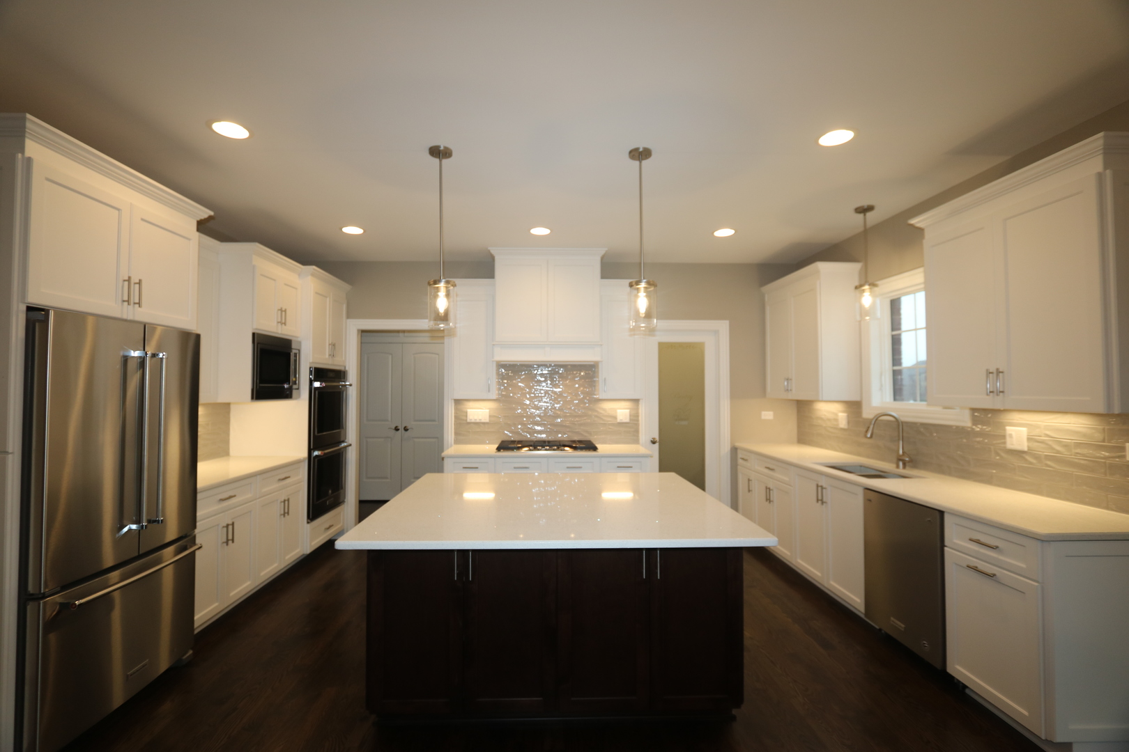 8613 High Stone Way Frankfort, IL 60423 - Photo 9 of 31 a large kitchen with kitchen island a sink stainless steel appliances and cabinets