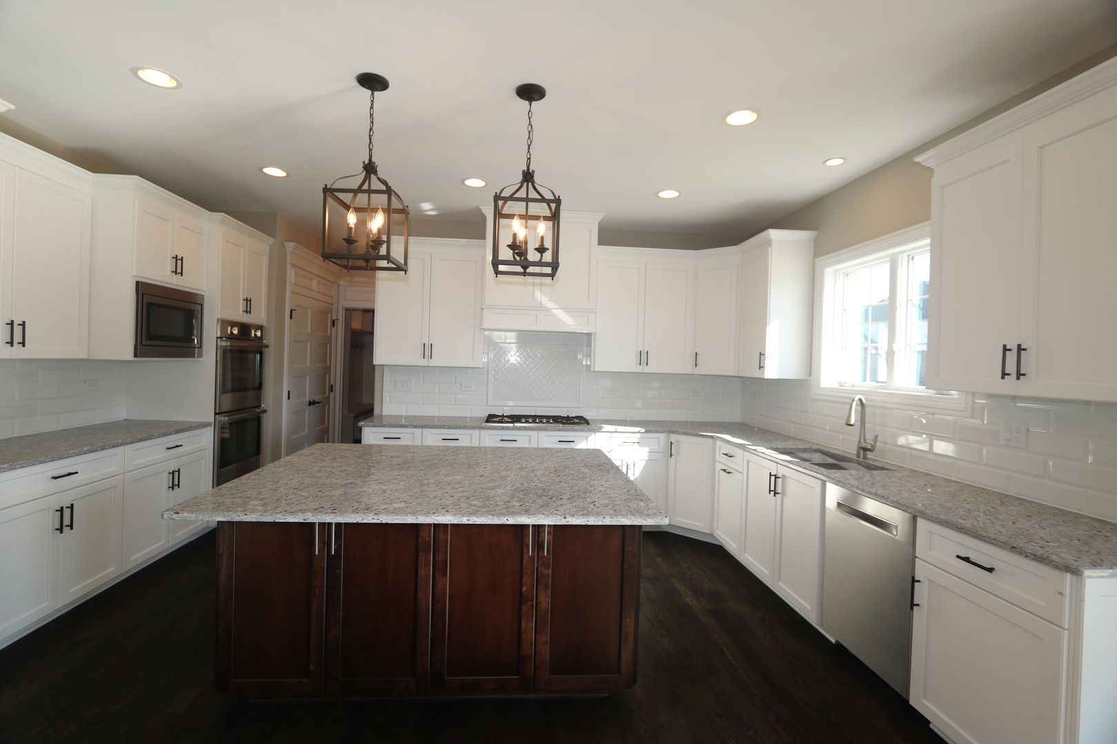 8613 High Stone Way Frankfort, IL 60423 - Photo 10 of 31 a large kitchen with stainless steel appliances kitchen island a large island in the center