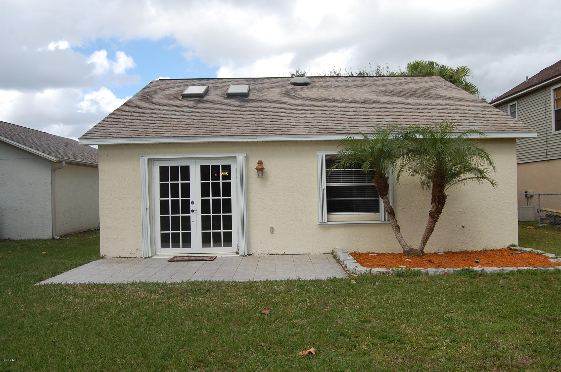 4168 Bayberry Drive Melbourne, FL 32901 - Photo 1 of 15 back view