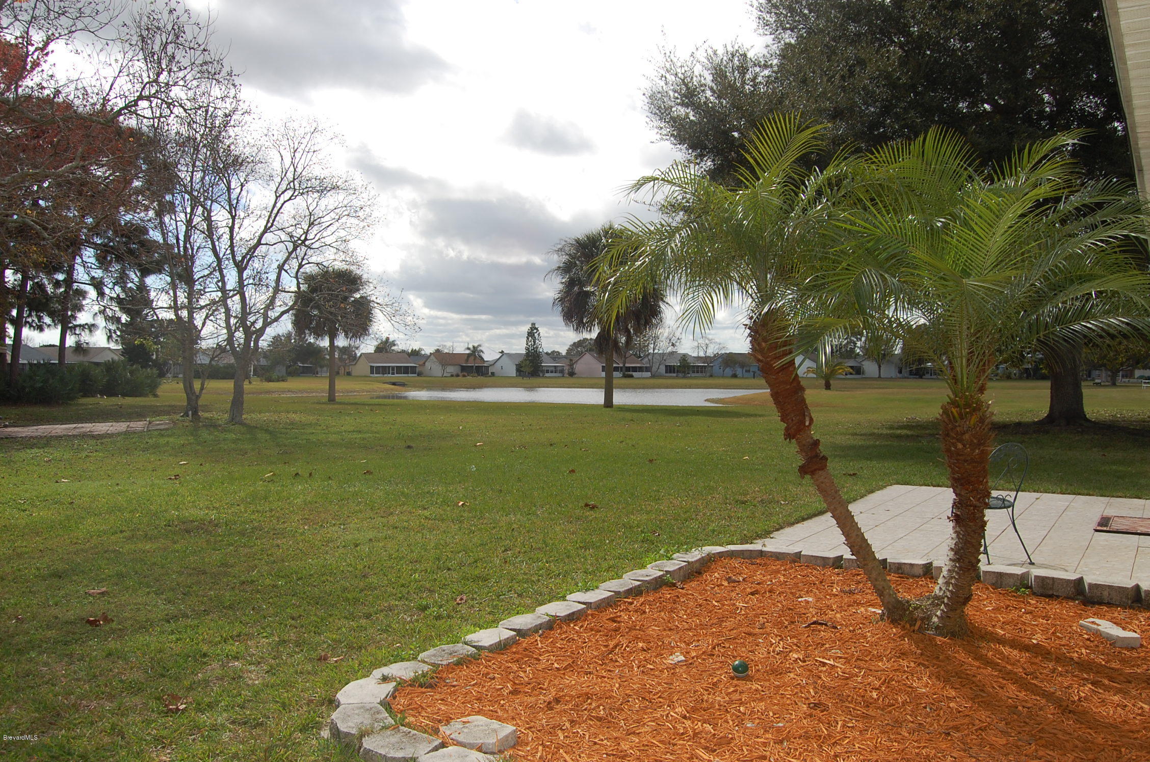 4168 Bayberry Drive Melbourne, FL 32901 - Photo 3 of 15 backyard/pond