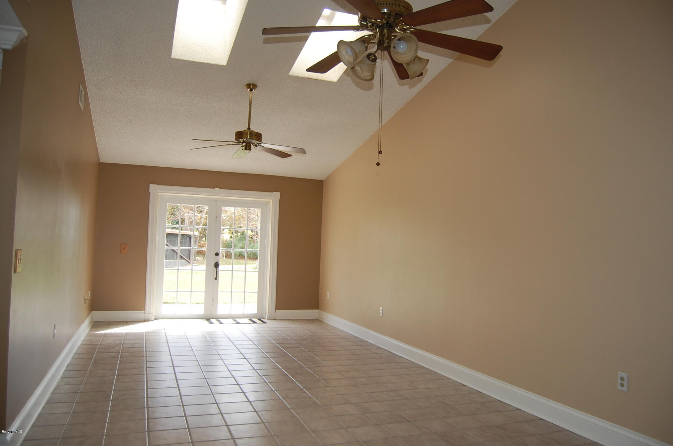 4168 Bayberry Drive Melbourne, FL 32901 - Photo 8 of 15 living/dining