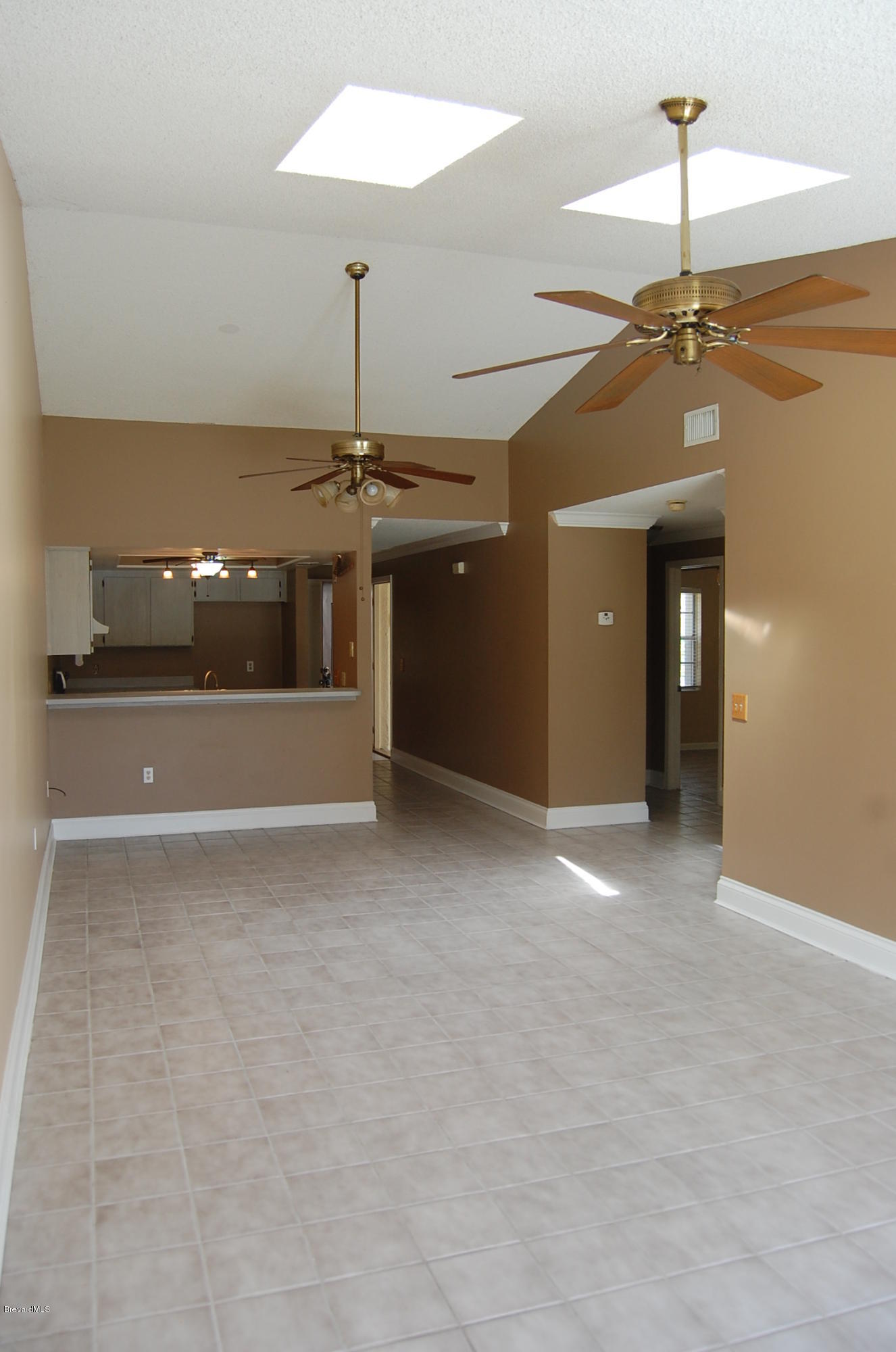 4168 Bayberry Drive Melbourne, FL 32901 - Photo 9 of 15 Living/dining