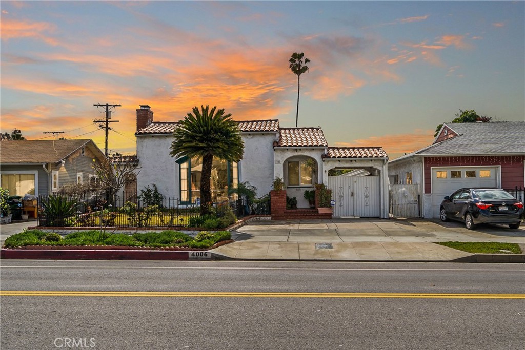 4006 York Boulevard Los Angeles, CA 90065 - Photo 1 of 33 a front view of a house with a garden and parking