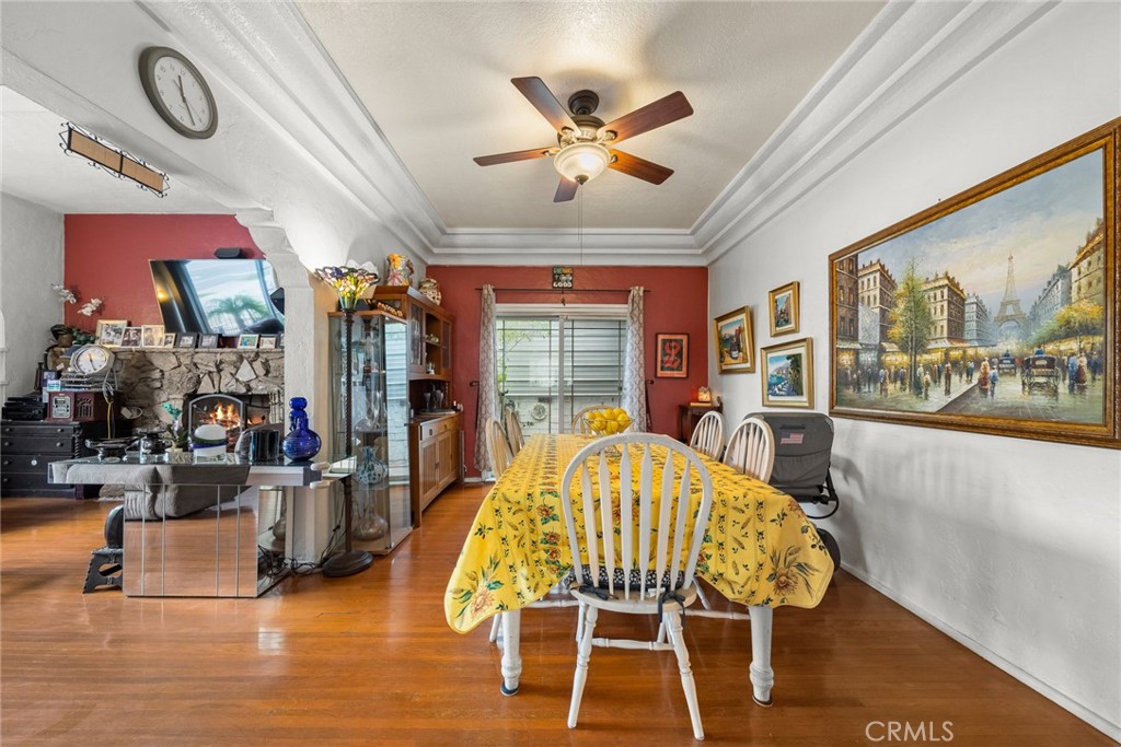 4006 York Boulevard Los Angeles, CA 90065 - Photo 14 of 33 a view of a dining room with furniture window and wooden floor