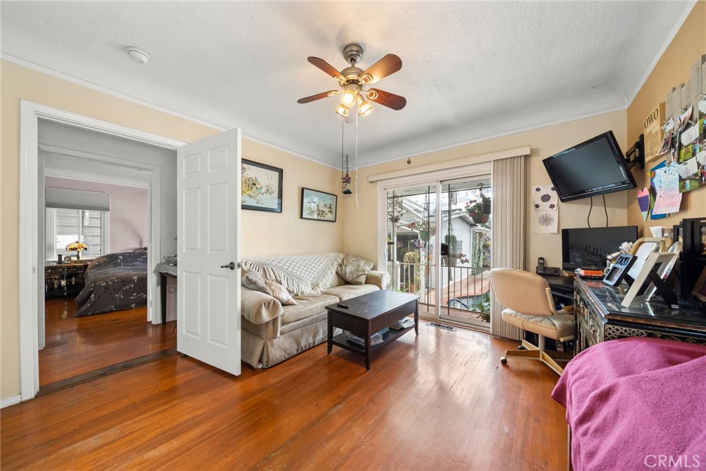 4006 York Boulevard Los Angeles, CA 90065 - Photo 24 of 33 a living room with furniture and a flat screen tv