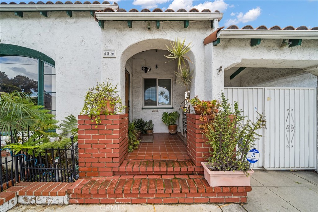 4006 York Boulevard Los Angeles, CA 90065 - Photo 3 of 33 a front view of a house with garden