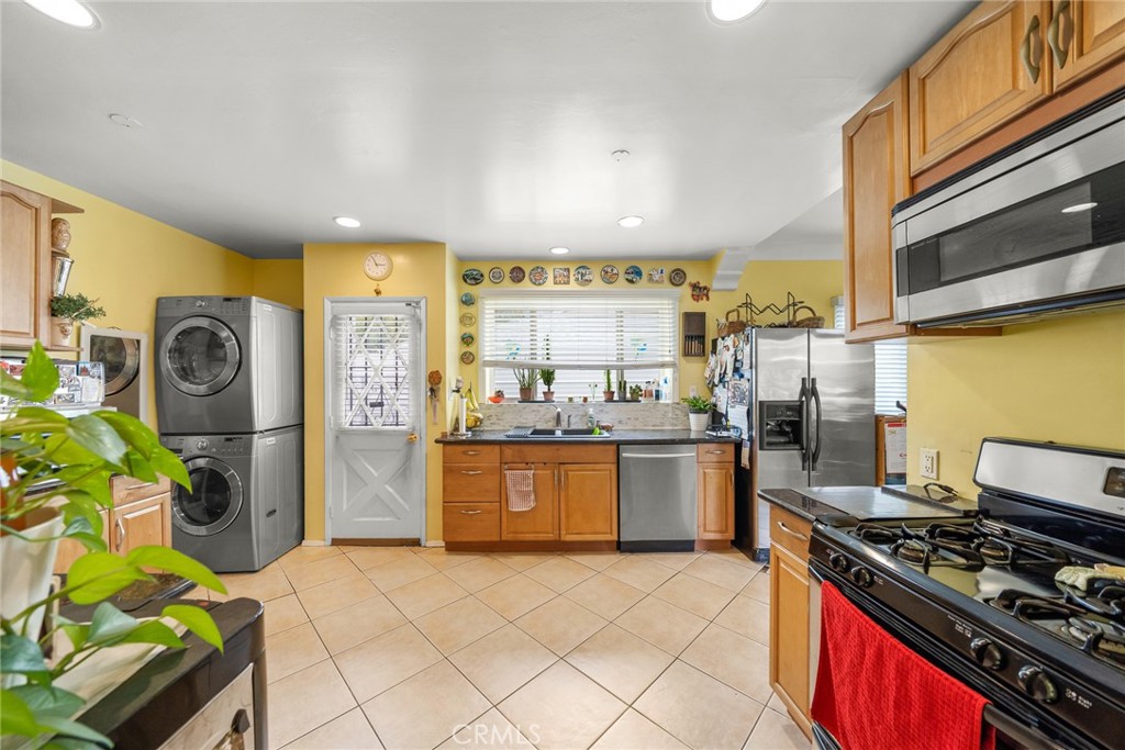 4006 York Boulevard Los Angeles, CA 90065 - Photo 10 of 33 a kitchen with a stove and a refrigerator