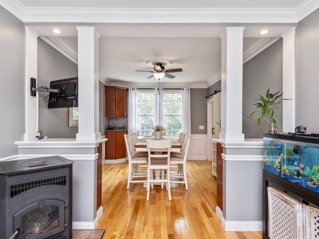 40 Rustic Drive Worcester, MA 01609 - Photo 13 of 39 a living room with furniture a fireplace and a flat screen tv