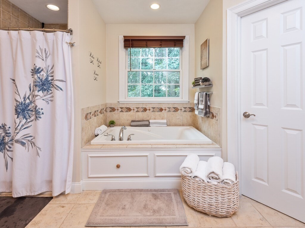 40 Rustic Drive Worcester, MA 01609 - Photo 19 of 39 a bathroom with a bathtub and shower