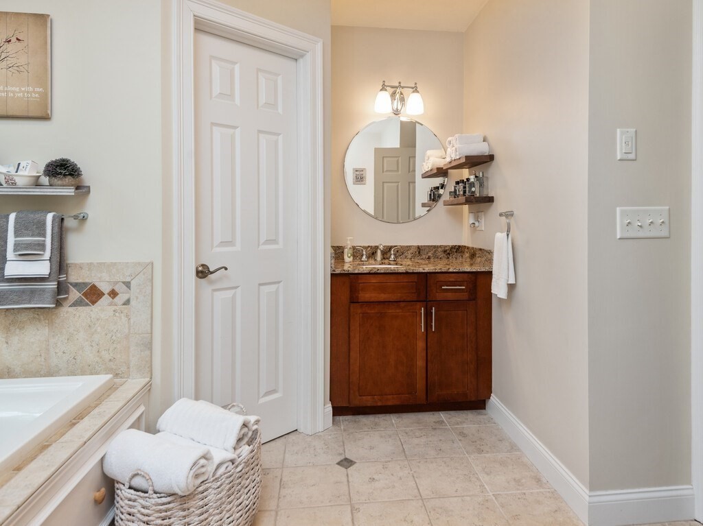 40 Rustic Drive Worcester, MA 01609 - Photo 20 of 39 a bathroom with a sink and a mirror