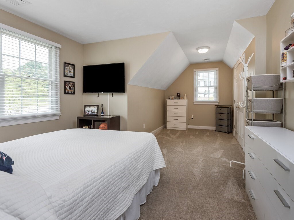 40 Rustic Drive Worcester, MA 01609 - Photo 22 of 39 a bedroom with a bed and a flat screen tv