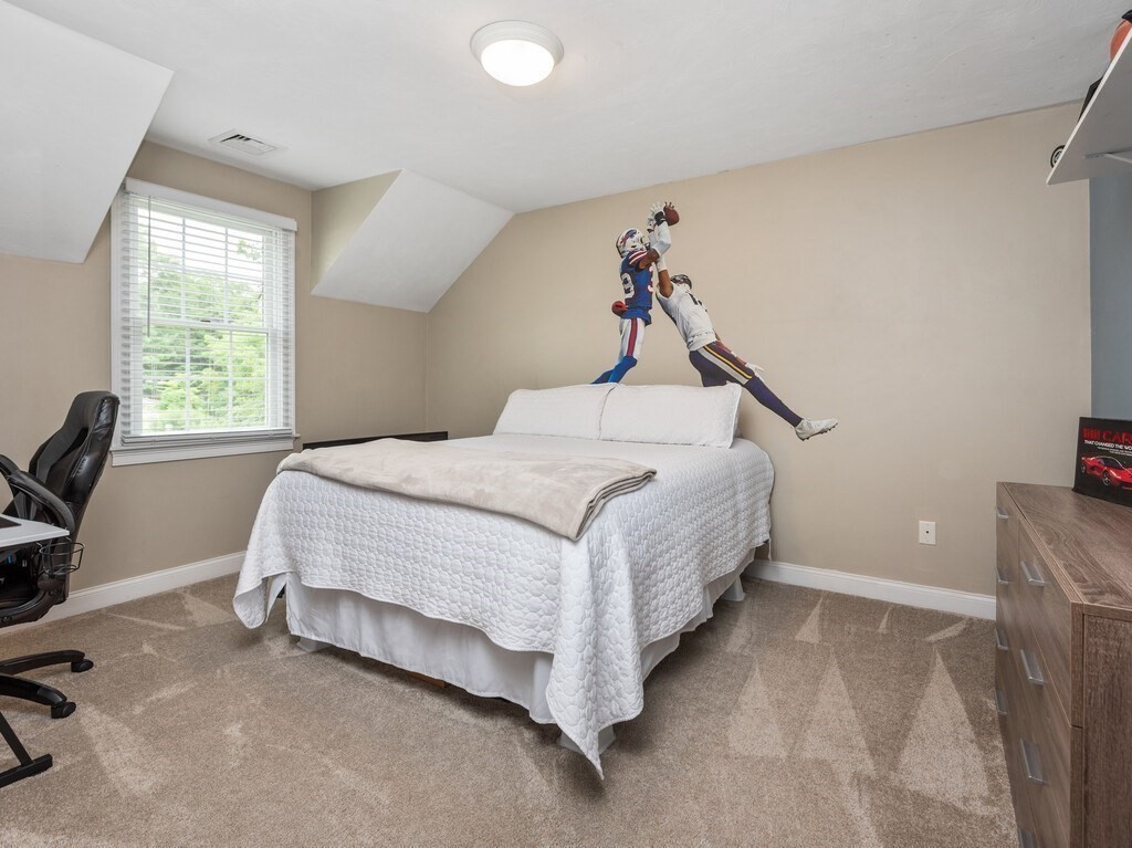 40 Rustic Drive Worcester, MA 01609 - Photo 24 of 39 a bedroom with a bed and window