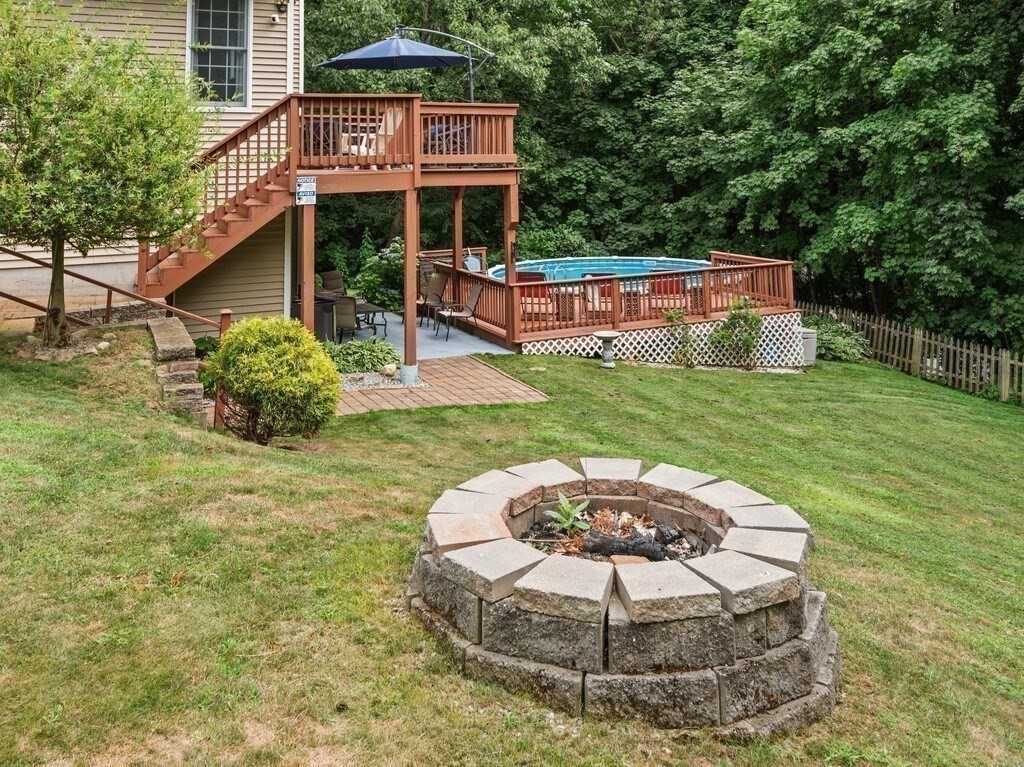 40 Rustic Drive Worcester, MA 01609 - Photo 32 of 39 a front view of a house with a yard