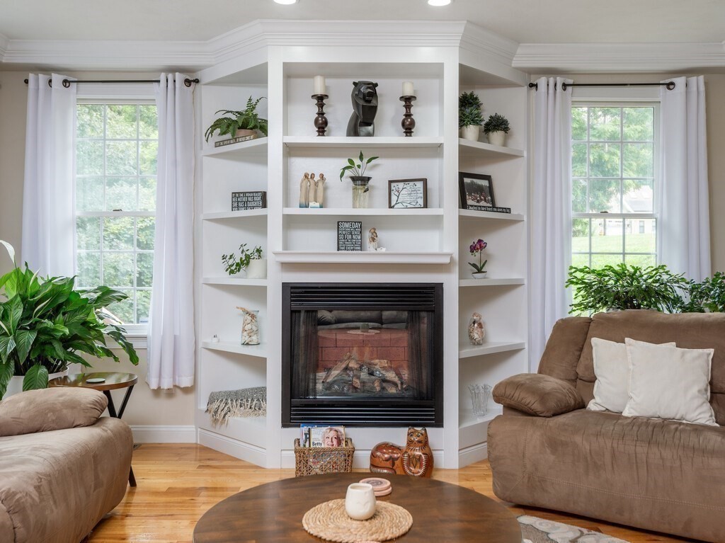40 Rustic Drive Worcester, MA 01609 - Photo 8 of 39 a living room with furniture and a fireplace