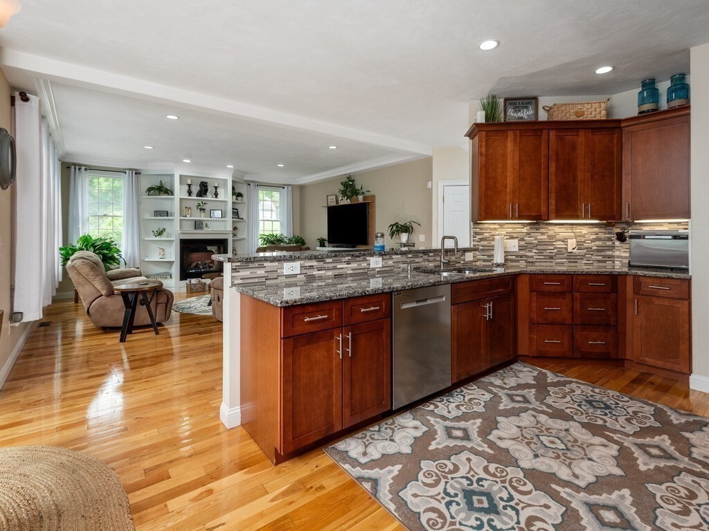 40 Rustic Drive Worcester, MA 01609 - Photo 9 of 39 a large kitchen with a table and chairs in it